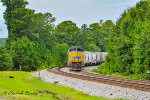 A WB Grain Train Patiently Awaits the Clearing of a Wreck Ahead